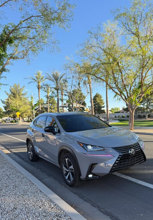 Silver Lexus NX with window tint
